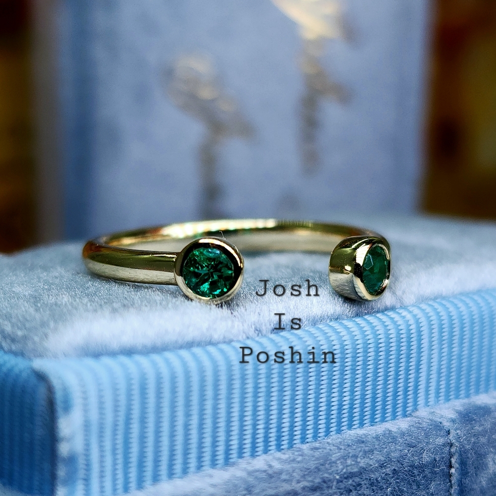 Open-ended round lab grown emerald ring in sterling silver